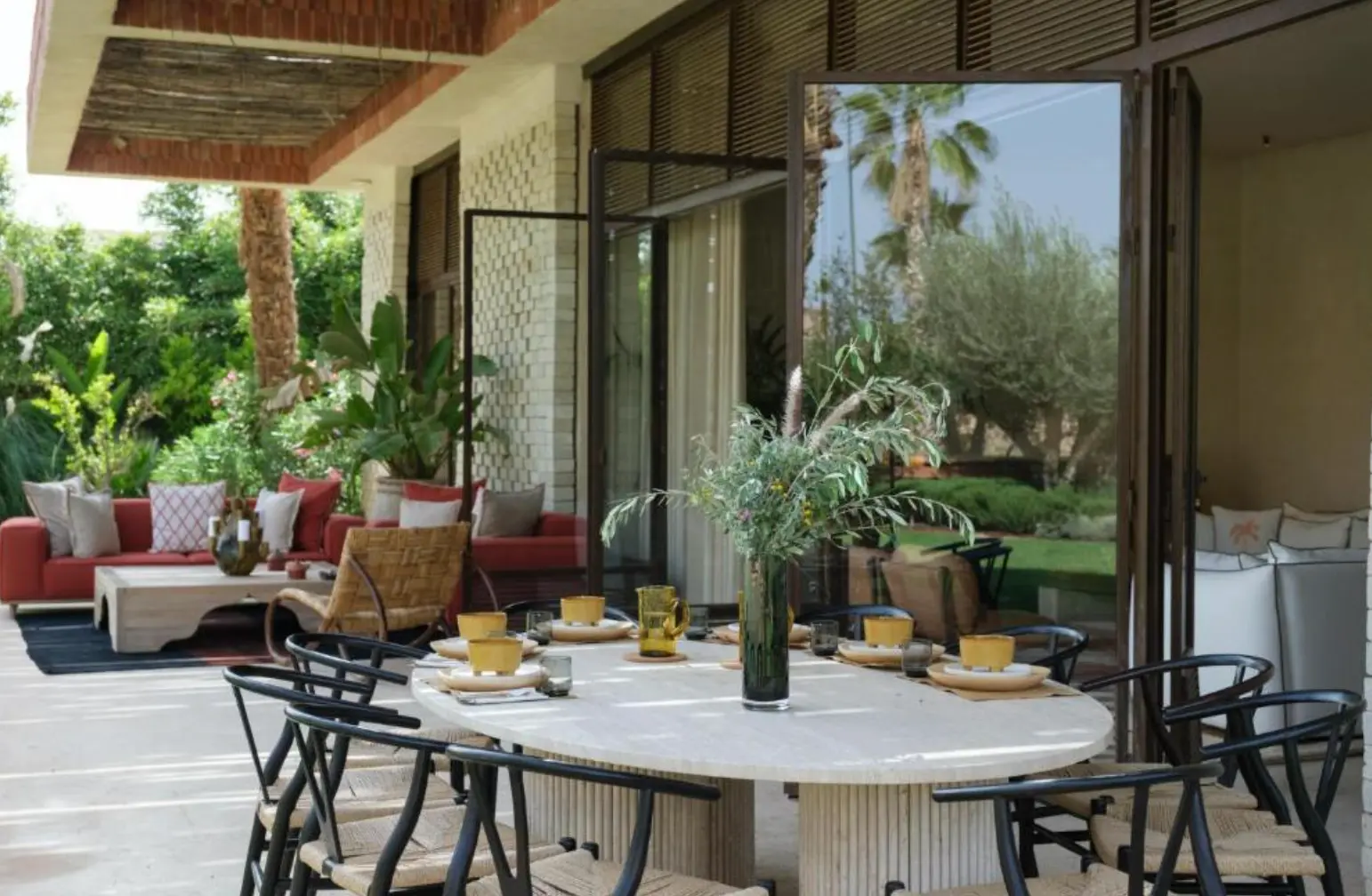 The shaded dining terrace at Villa Sama